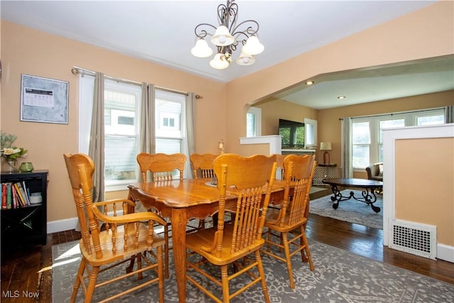 645 Saybolt Ave, Wooster, OH 44691 - dining space with a chandelier, plenty of natural light, and wood finished floors