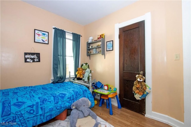 645 Saybolt Ave, Wooster, OH 44691 - bedroom with wood finished floors and baseboards