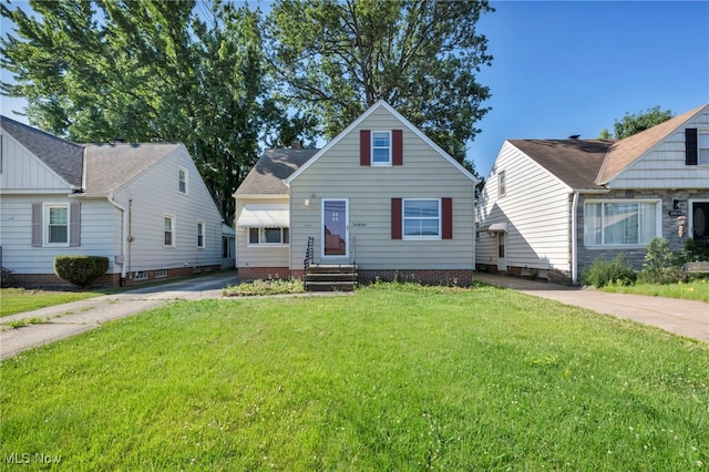 24850 Shoreview Ave, Euclid, OH 44123 - bungalow-style house with a front yard