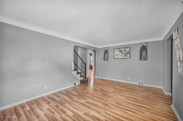 24850 Shoreview Ave, Euclid, OH 44123 - spare room with light wood-style floors and stairway