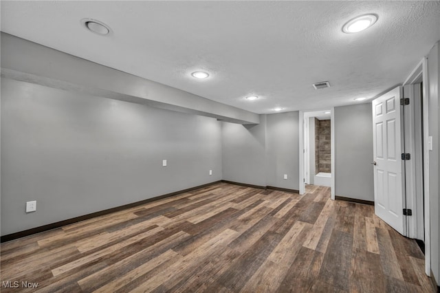 24850 Shoreview Ave, Euclid, OH 44123 - finished below grade area with a textured ceiling, wood finished floors, and recessed lighting