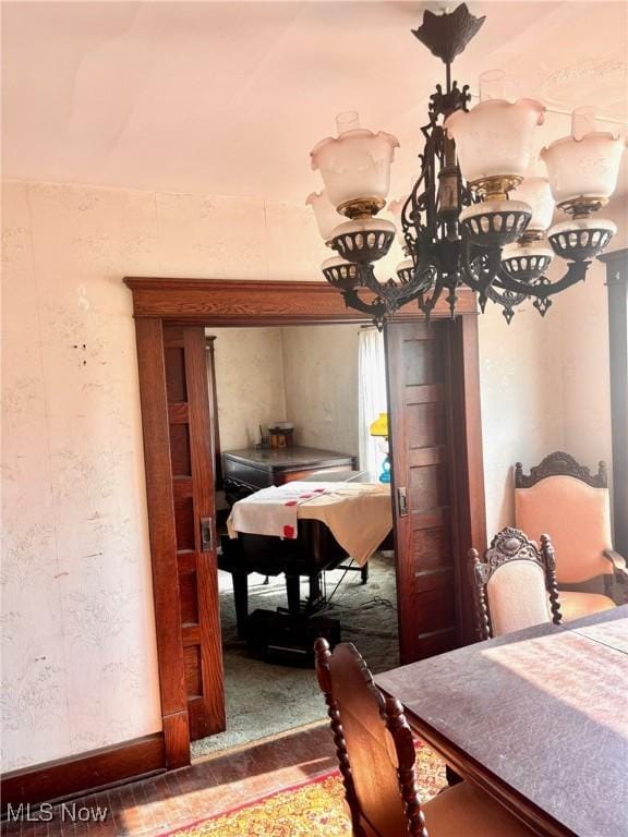 8 E Main St, New Concord, OH 43762 - bedroom with a chandelier