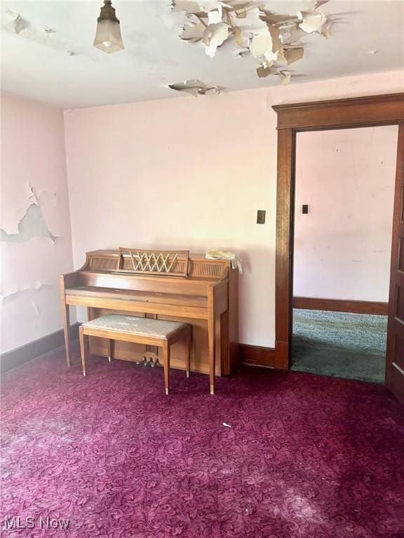 8 E Main St, New Concord, OH 43762 - carpeted dining room featuring baseboards
