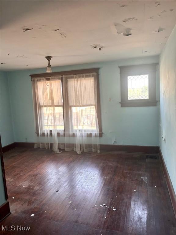 8 E Main St, New Concord, OH 43762 - empty room with wood-type flooring