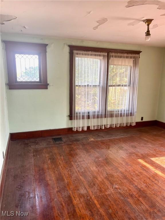 8 E Main St, New Concord, OH 43762 - unfurnished room featuring hardwood / wood-style flooring