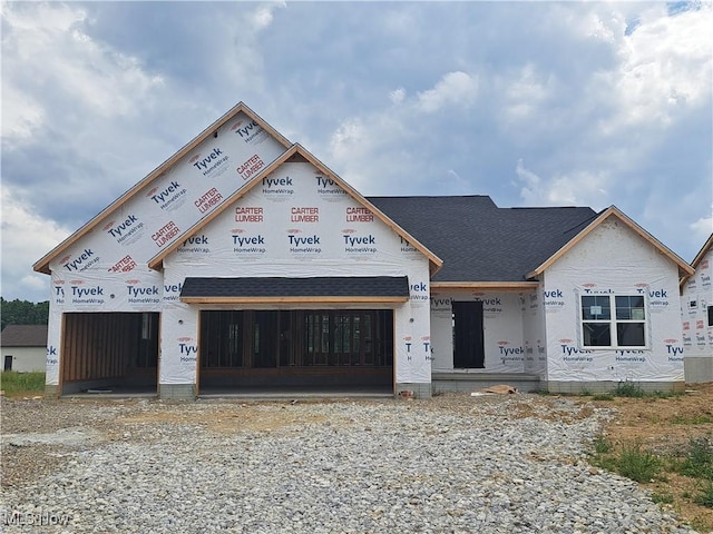 778 Fair Vista Cir SW, Hartville, OH 44632 - unfinished property featuring a garage and a shingled roof