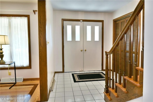 8518 Four Seasons Trl, Poland, OH 44514 - tiled foyer entrance with plenty of natural light and stairway
