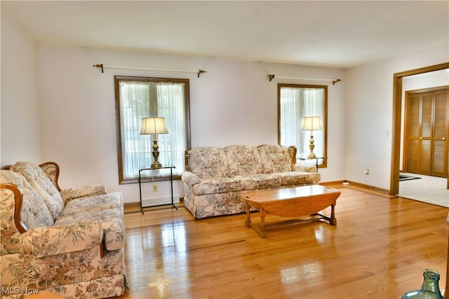8518 Four Seasons Trl, Poland, OH 44514 - living room with baseboards and light wood finished floors