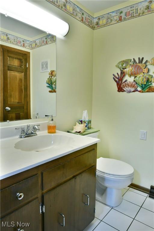 8518 Four Seasons Trl, Poland, OH 44514 - half bathroom featuring vanity and tile patterned flooring