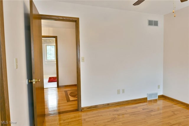 8518 Four Seasons Trl, Poland, OH 44514 - unfurnished room featuring a ceiling fan and light wood-style flooring