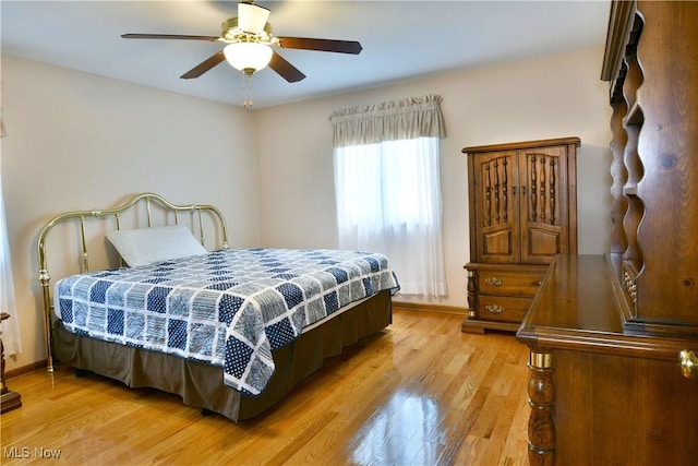 8518 Four Seasons Trl, Poland, OH 44514 - bedroom with light wood-type flooring and a ceiling fan