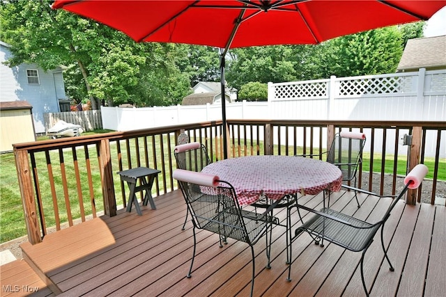 8518 Four Seasons Trl, Poland, OH 44514 - wooden terrace featuring outdoor dining area