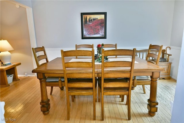 252 Greenbriar Dr, Cortland, OH 44410 - dining space featuring light wood-type flooring and baseboards