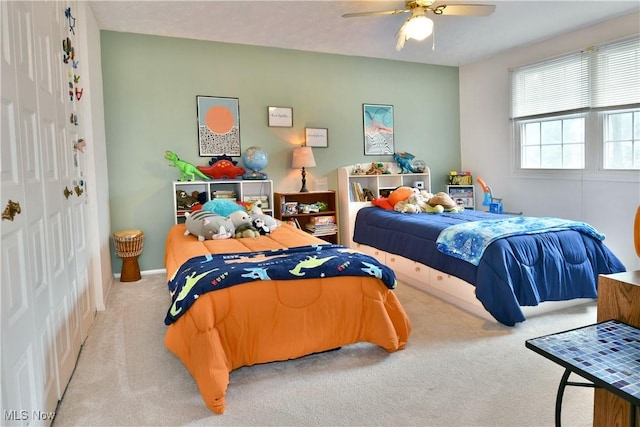 252 Greenbriar Dr, Cortland, OH 44410 - carpeted bedroom featuring a closet and ceiling fan