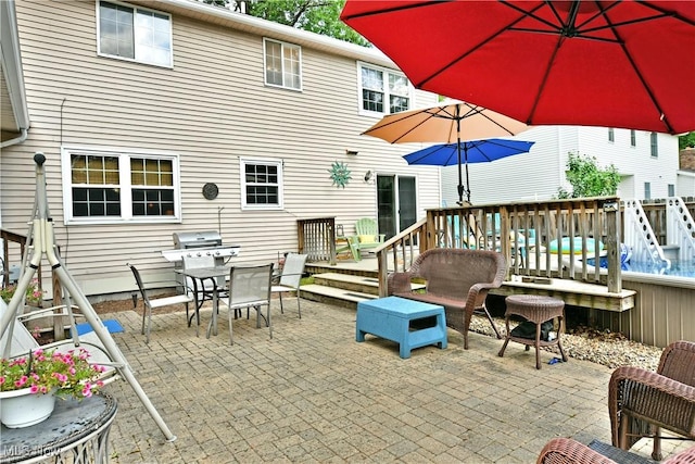 252 Greenbriar Dr, Cortland, OH 44410 - view of patio / terrace featuring outdoor dining area, a grill, and a deck