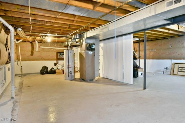 252 Greenbriar Dr, Cortland, OH 44410 - unfinished below grade area featuring gas water heater and heating unit