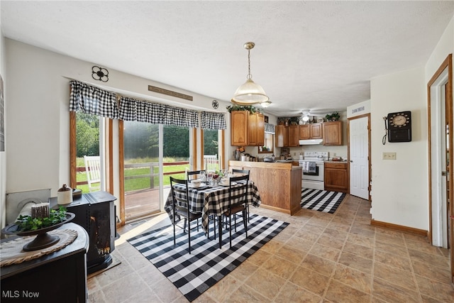3823 Kyle Rd, Dorset, OH 44032 - dining area with baseboards