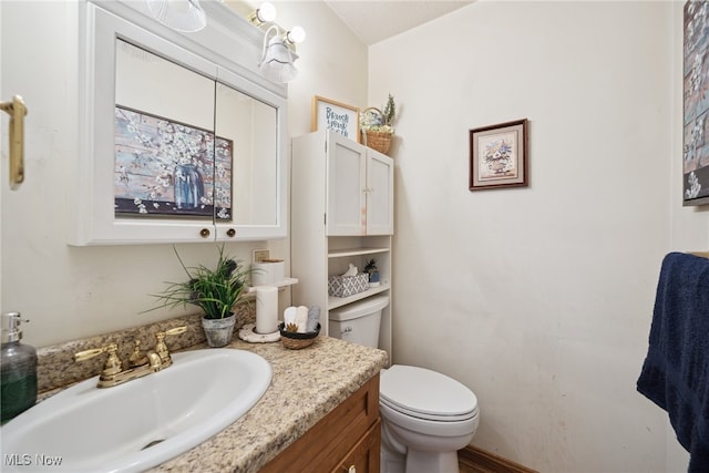 3823 Kyle Rd, Dorset, OH 44032 - bathroom featuring toilet and vanity