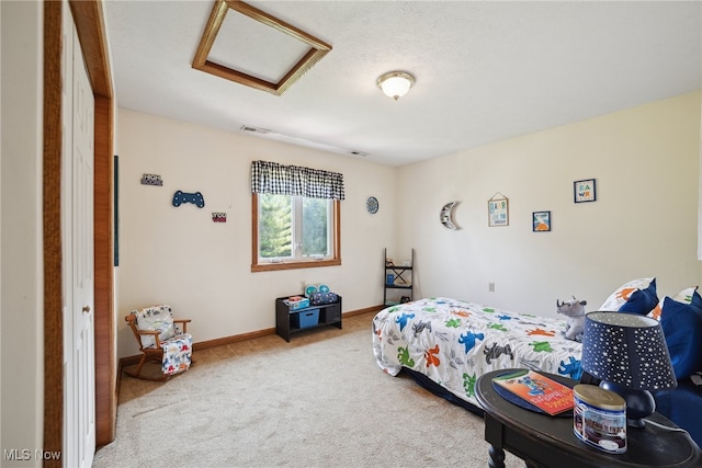 3823 Kyle Rd, Dorset, OH 44032 - carpeted bedroom with attic access and baseboards