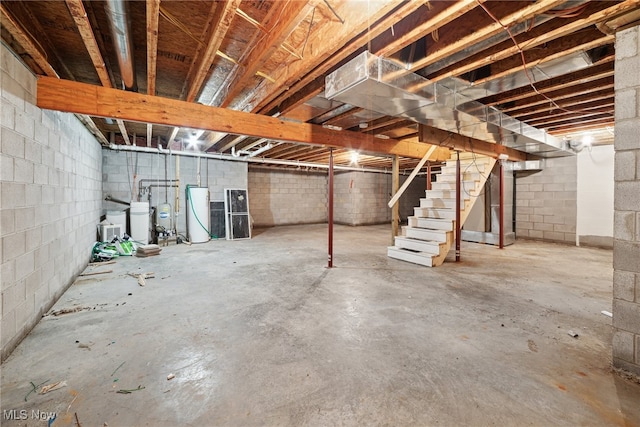 3823 Kyle Rd, Dorset, OH 44032 - unfinished basement featuring stairway and a water softener