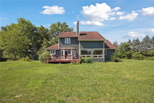 3823 Kyle Rd, Dorset, OH 44032 - back of house with a wooden deck, a yard, and a chimney