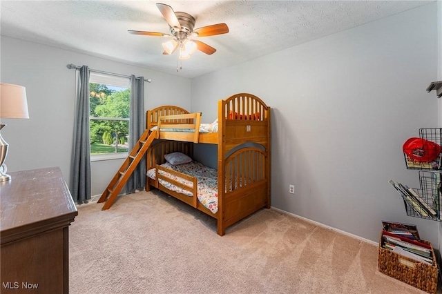 300 Chatham Dr, Aurora, OH 44202 - bedroom with light carpet, ceiling fan, and a textured ceiling