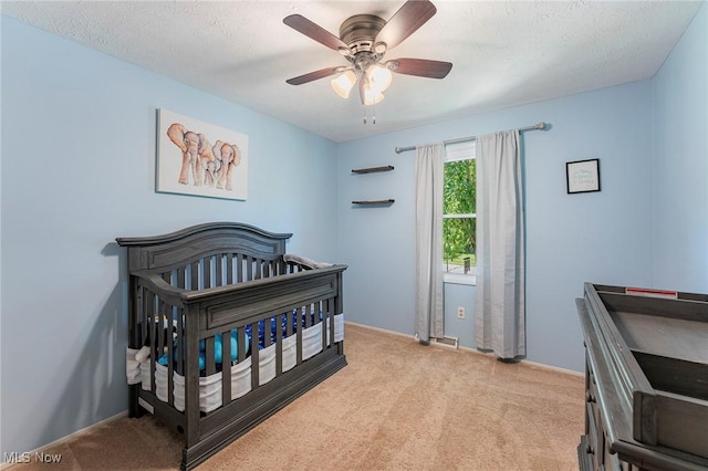 300 Chatham Dr, Aurora, OH 44202 - bedroom featuring carpet flooring, a nursery area, and ceiling fan