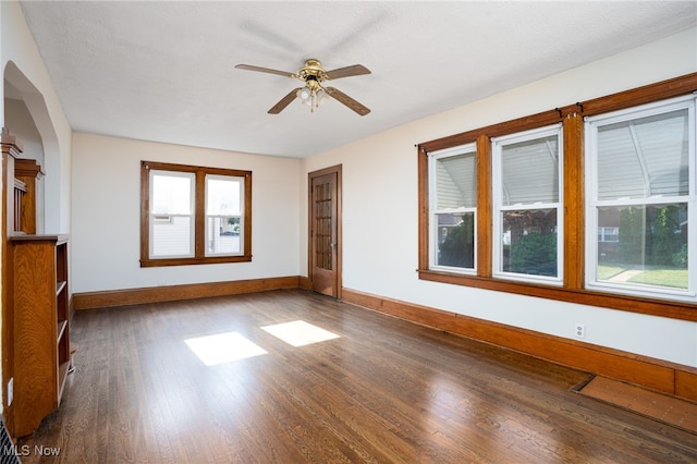 289-2891/2 E Baird Ave, Barberton, OH 44203 - spare room with dark wood-style floors and a ceiling fan