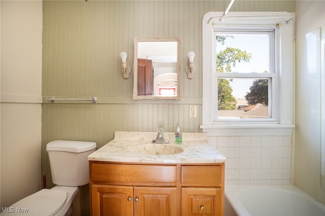289-2891/2 E Baird Ave, Barberton, OH 44203 - full bath featuring a tub to relax in, vanity, and healthy amount of natural light