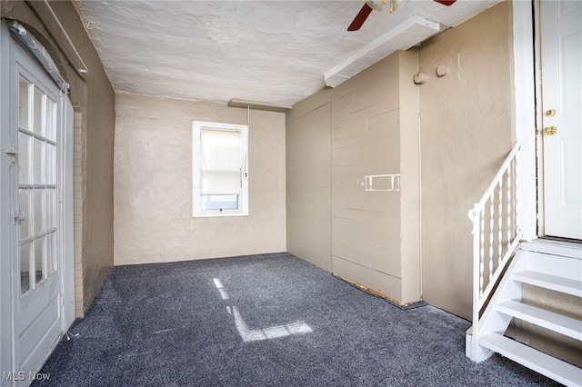 289-2891/2 E Baird Ave, Barberton, OH 44203 - carpeted empty room featuring a ceiling fan