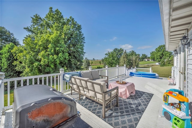 9827 Akron Rd, Rittman, OH 44270 - wooden deck featuring outdoor lounge area and area for grilling
