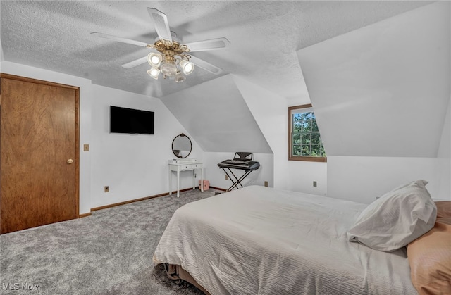 9827 Akron Rd, Rittman, OH 44270 - carpeted bedroom featuring a textured ceiling, vaulted ceiling, and a ceiling fan