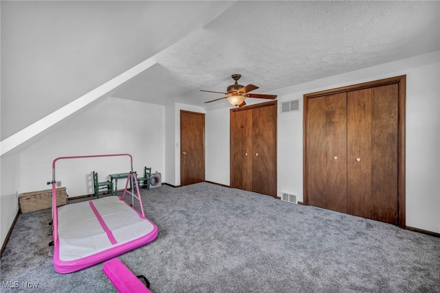 9827 Akron Rd, Rittman, OH 44270 - rec room featuring carpet, a textured ceiling, and ceiling fan