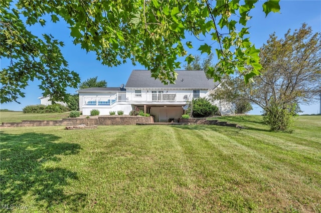 9827 Akron Rd, Rittman, OH 44270 - back of property featuring a lawn and a deck