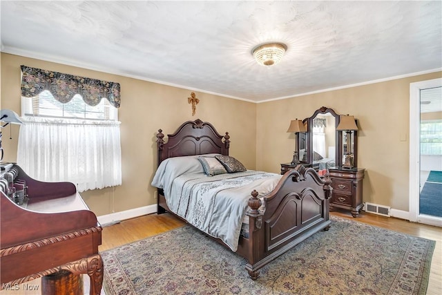 6100 Glenwood Ave, Boardman, OH 44512 - bedroom featuring wood finished floors and ornamental molding