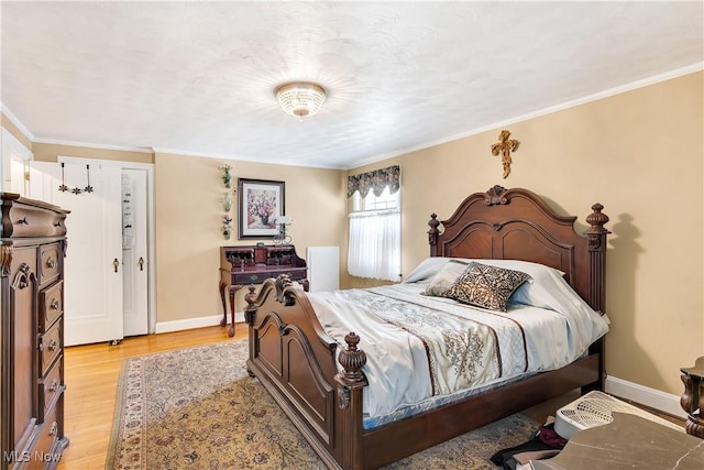 6100 Glenwood Ave, Boardman, OH 44512 - bedroom featuring light wood-type flooring and crown molding