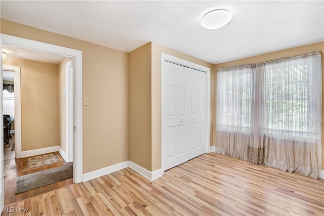6100 Glenwood Ave, Boardman, OH 44512 - unfurnished bedroom featuring light wood-style floors and a closet