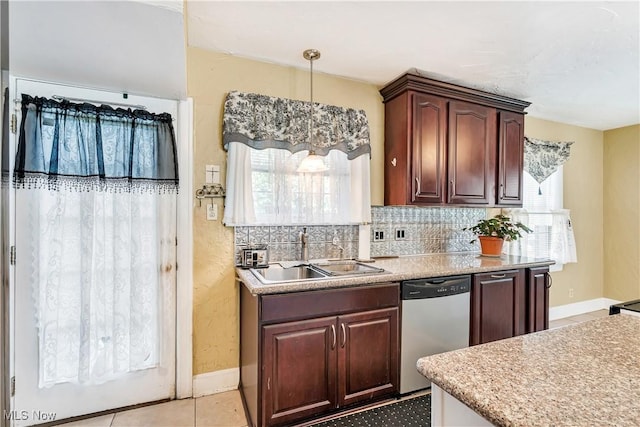 6100 Glenwood Ave, Boardman, OH 44512 - kitchen with stainless steel dishwasher, light countertops, decorative backsplash, and dark brown cabinetry