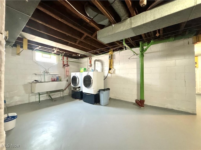 3109 Latimer Ave, Ashtabula, OH 44004 - below grade area with separate washer and dryer and a sink