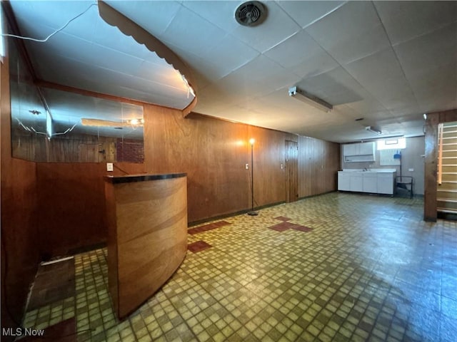 3109 Latimer Ave, Ashtabula, OH 44004 - basement with tile patterned floors and wooden walls