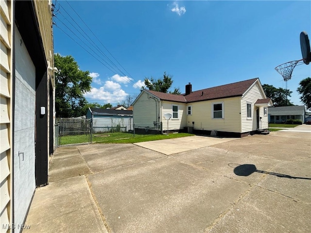 3109 Latimer Ave, Ashtabula, OH 44004 - rear view of property featuring a chimney
