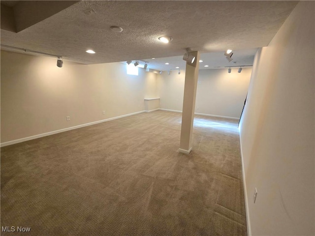 4312 Brooks Ct, Lorain, OH 44053 - finished basement with carpet flooring, a textured ceiling, recessed lighting, and track lighting