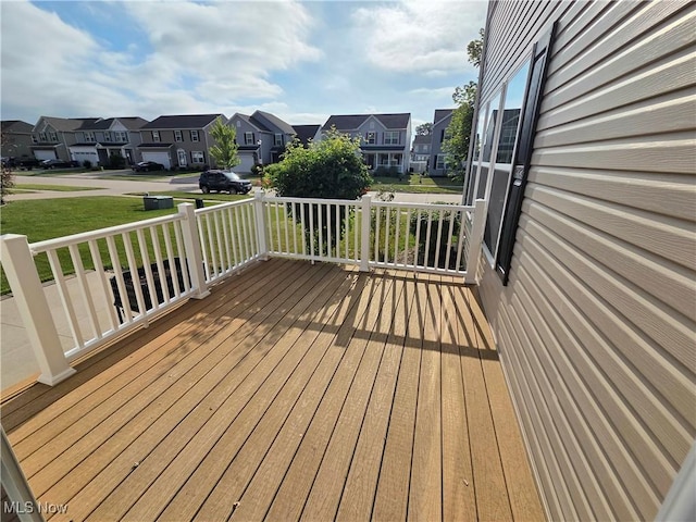 4312 Brooks Ct, Lorain, OH 44053 - wooden deck featuring a residential view