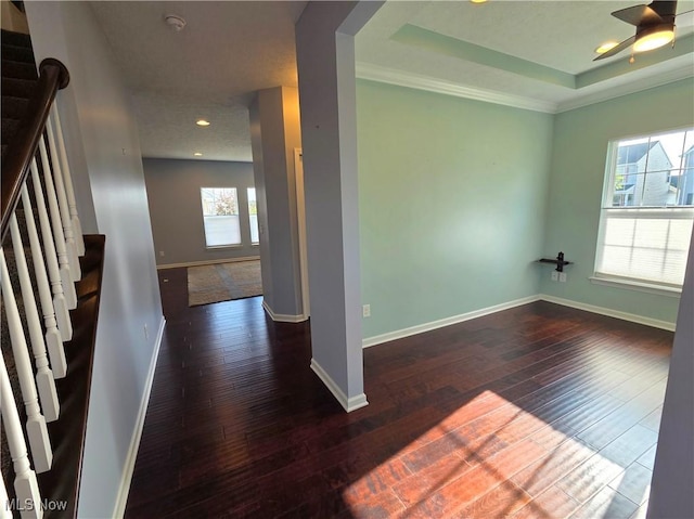 4312 Brooks Ct, Lorain, OH 44053 - spare room with hardwood / wood-style flooring, stairway, ceiling fan, recessed lighting, and a raised ceiling