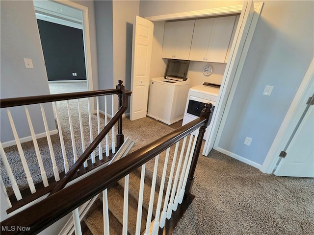4312 Brooks Ct, Lorain, OH 44053 - corridor with washer and clothes dryer, an upstairs landing, and dark colored carpet
