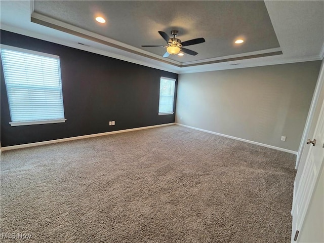 4312 Brooks Ct, Lorain, OH 44053 - carpeted spare room with a raised ceiling, a ceiling fan, recessed lighting, and crown molding