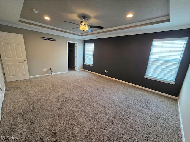 4312 Brooks Ct, Lorain, OH 44053 - spare room featuring a raised ceiling, ceiling fan, carpet flooring, crown molding, and recessed lighting