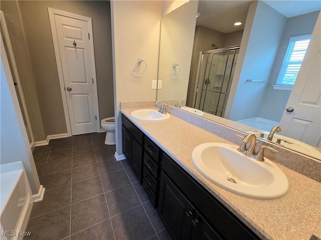 4312 Brooks Ct, Lorain, OH 44053 - bathroom with a shower stall, tile patterned flooring, double vanity, and a bath