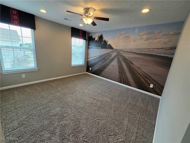 4312 Brooks Ct, Lorain, OH 44053 - empty room with carpet, recessed lighting, ceiling fan, and a textured ceiling