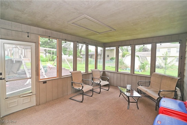 48 Mary Ann Ln, Youngstown, OH 44511 - sunroom / solarium featuring healthy amount of natural light, carpet flooring, and wooden walls